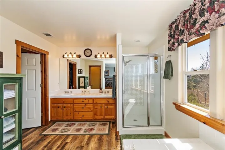 Bath off of the primary bedroom with great views