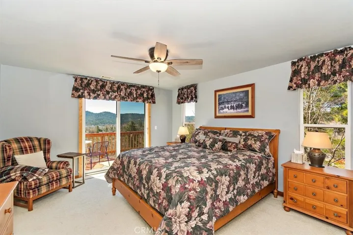 Primary ensuite with deck with lake view