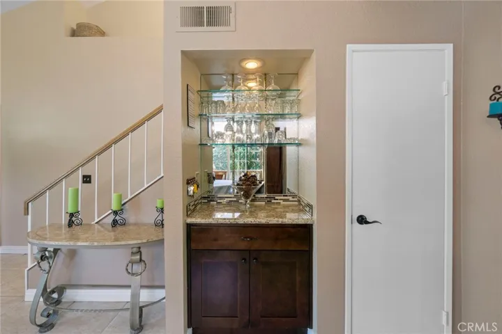 Built in mirrored bar area.