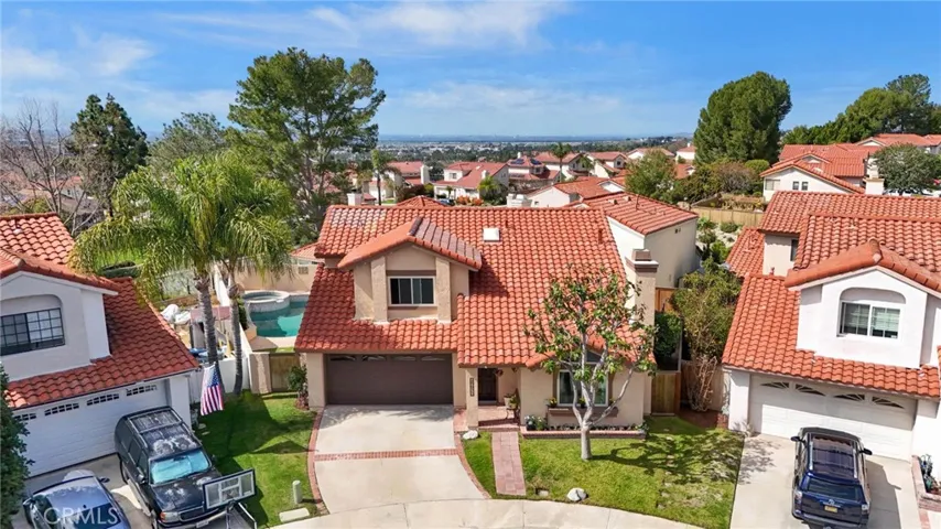 Spanish Tile roof, over-sized driveway