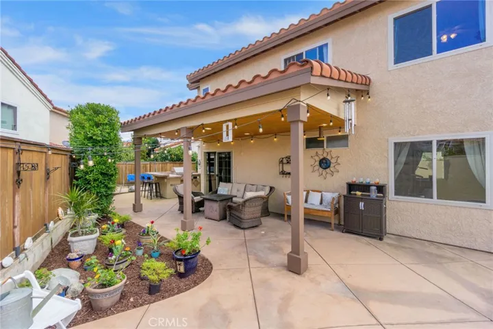 Sturdy, built to last, tile roofed patio cover and succulent garden area.