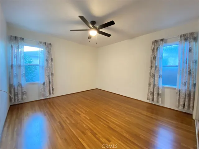 Bedroom with view of backyard