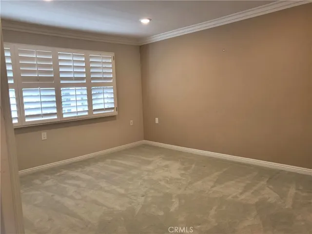 Primary suite bedroom, carpet flooring changed to laminate flooring.