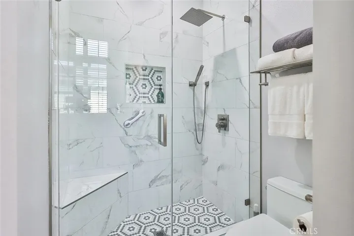marble tile shower & mosaic mini tile floor