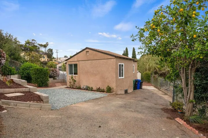 This gated and fully fenced yard has a huge parking space for your RV, trucks or just a play area for the kids.