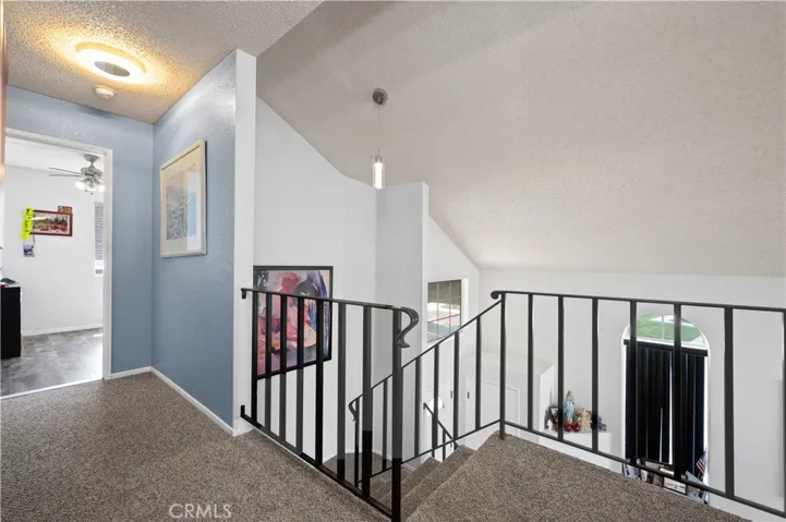 Upstairs staircase right to bedroom 1