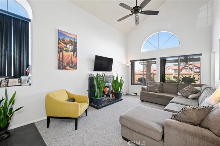 Living Room with view to back yard patio and pool