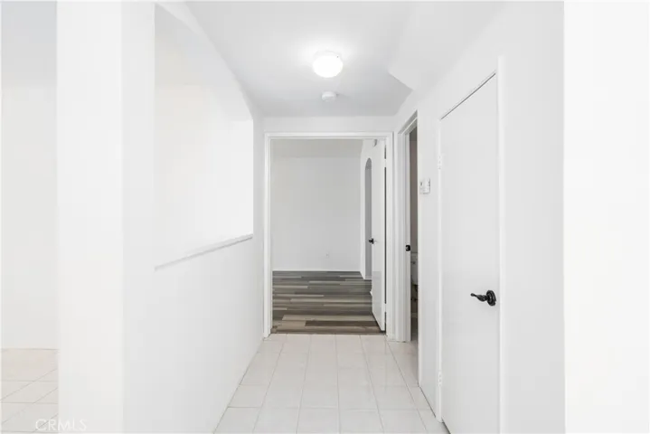 Hallway and Dbl-Door Entrance to Primary Bdrm