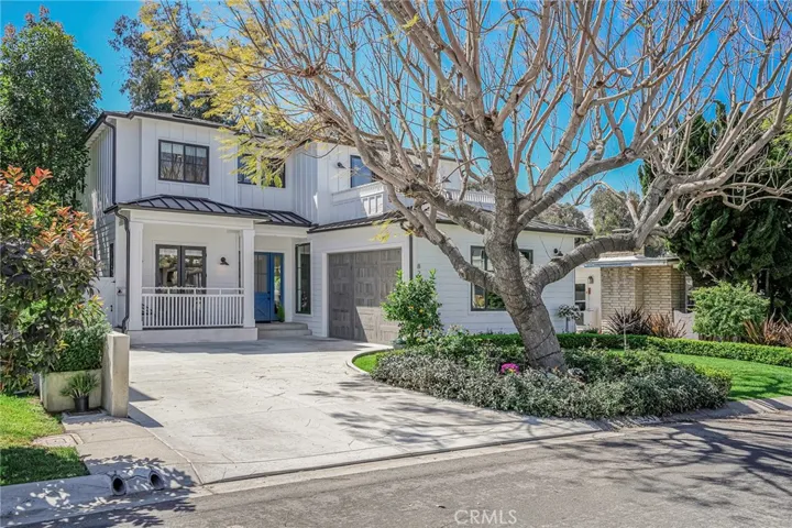 Beautiful curb appeal on a tree lined street.