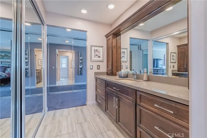Dual Closets with Mirrored Doors