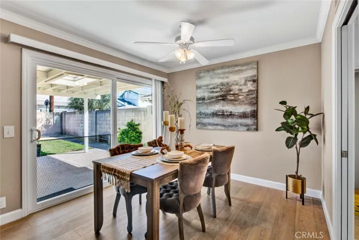 Dining Room with Slider Leading to the Park-Like Backyard