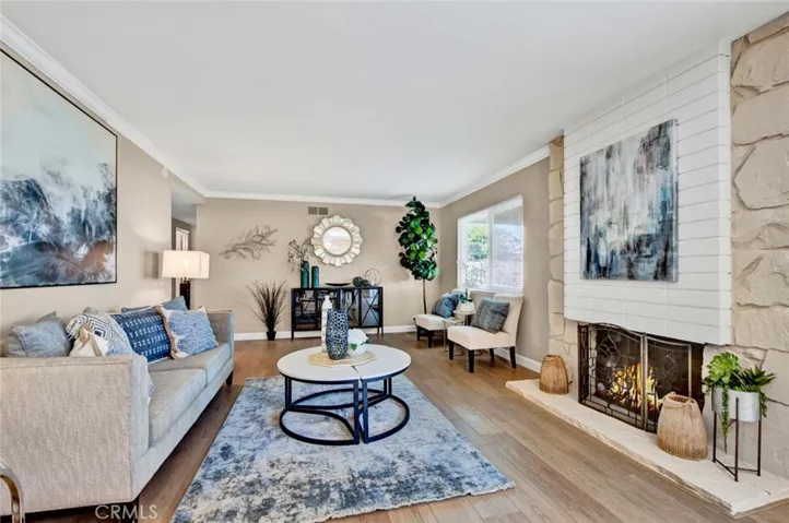 Fireplace, Crown Molding, Designer Paint, Wood Vinyl Flooring