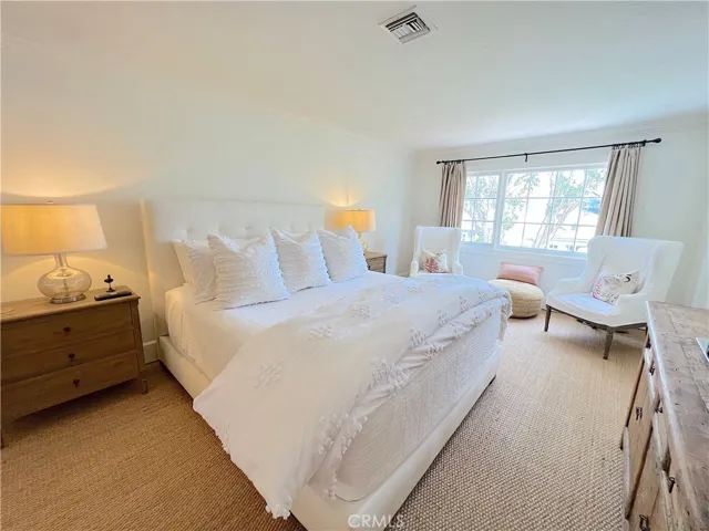 Primary bedroom with king size bed.