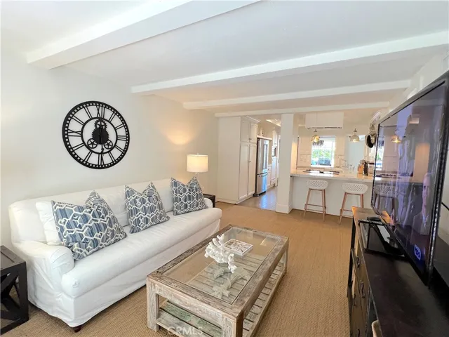 Family room with 75 inch Flat Screen Smart TV.