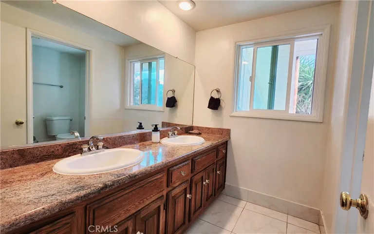 Upstairs Guest Bathroom with Dual Sinks