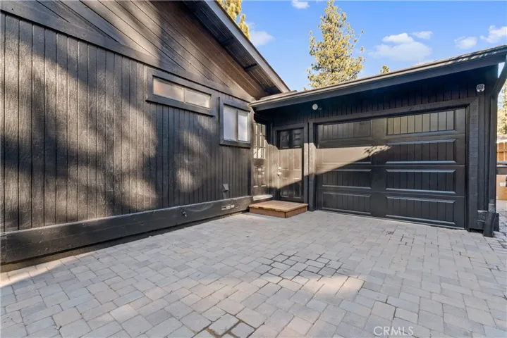 Side yard/parking area after garage drive thru