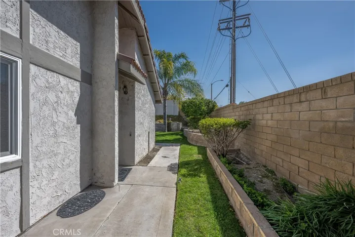 Pathway to front door behind gate