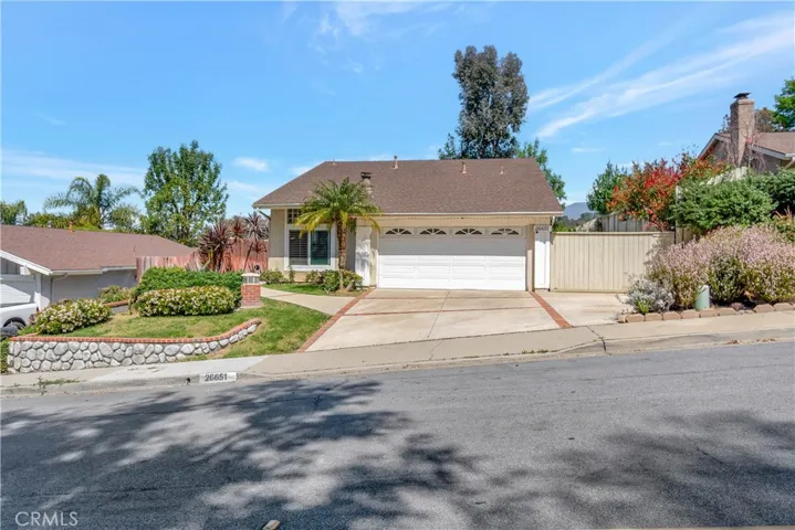 Beautiful curb appeal with RV/boat parking on the side