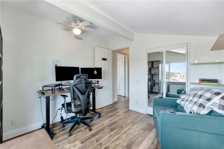 View of bedroom looking towards hallway