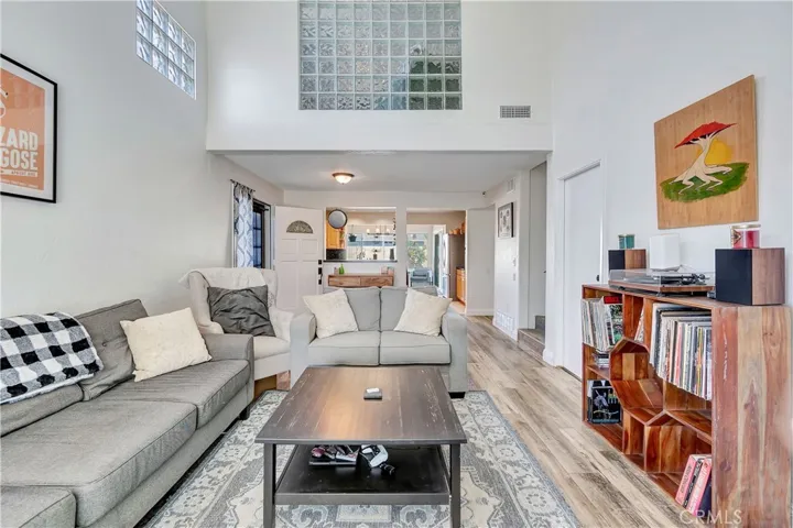 View of living room looking back towards kitchen.  So open and bright