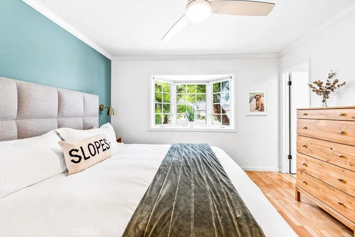 Master bedroom has natural lighting from the bay window