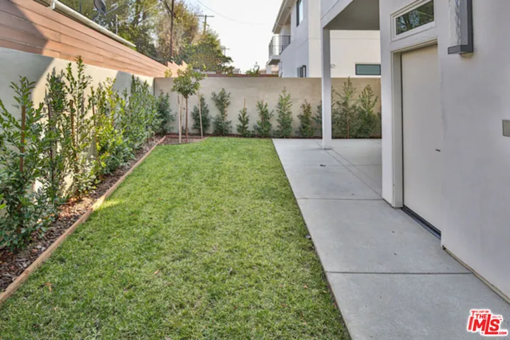 Outdoor space with artificial turf