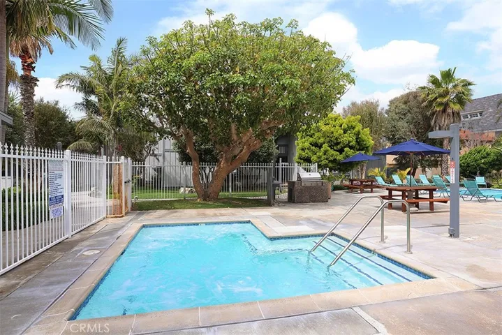 Main pool spa and stainless steel BBQ and picnic seating, perfect for entertaining.