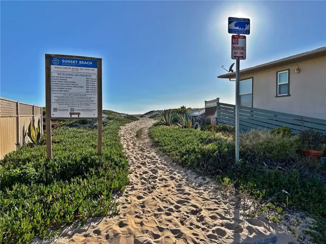 Jump across the street to the sand and the surf of beautiful Sunset Beach.