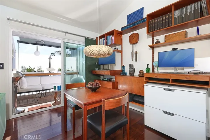 The dining area opens to the indoor/outdoor lounge.