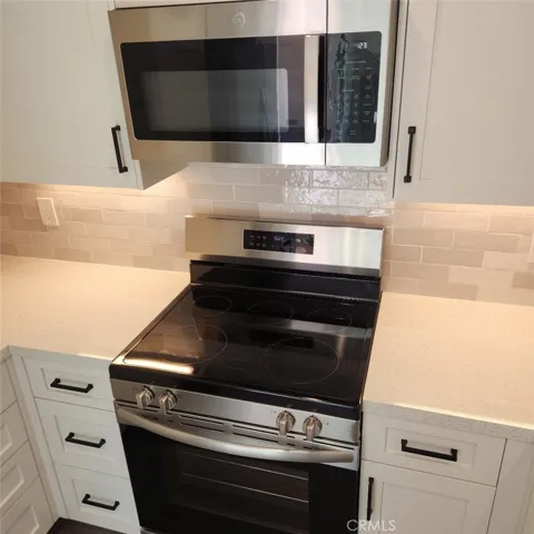 New Flat Top Electric Range & built in Microwave