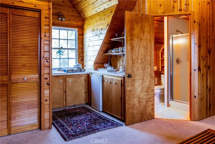 Studio has kitchenette and 3/4 bath.