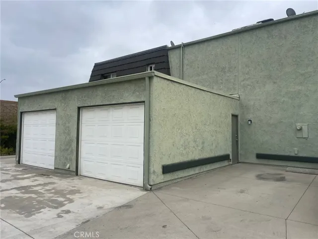 One car direct access garage with epoxy flooring plus one assigned parking space next to garage.