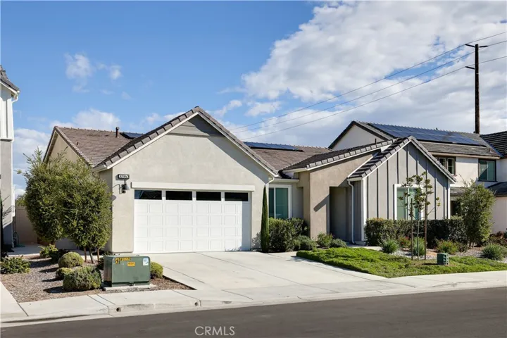 Single story with stucco board & batt design