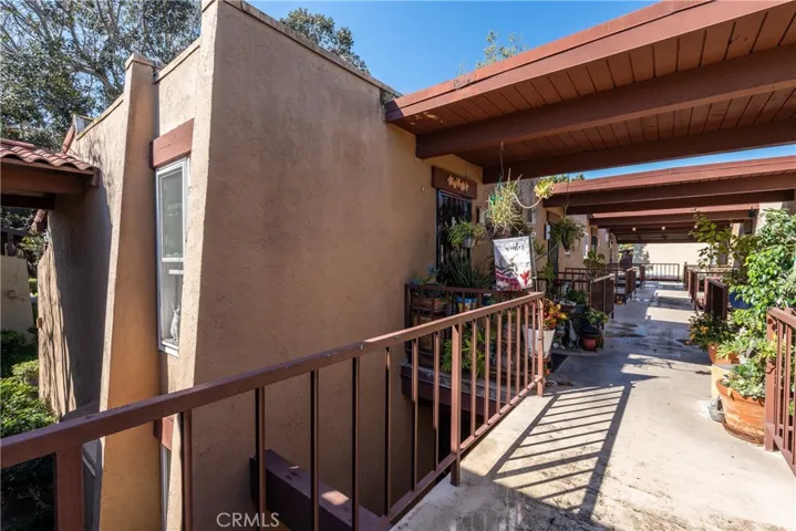 Carport parking is at the end of the walkway