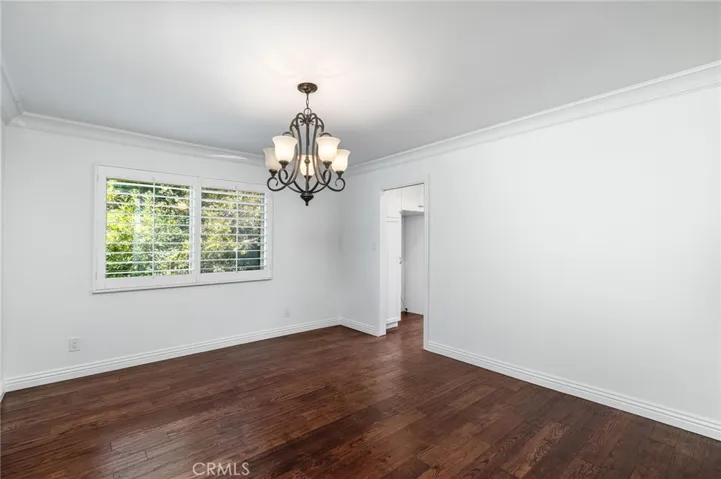 Separate dining room with pocket door access to kitchen.