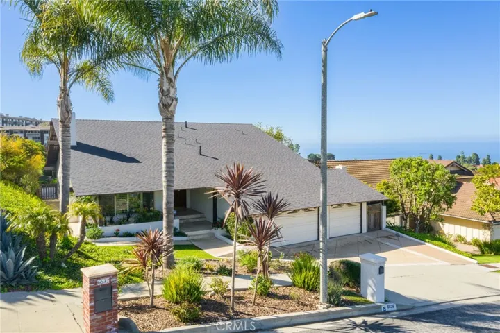 Beautifully landscaped coastal street view.