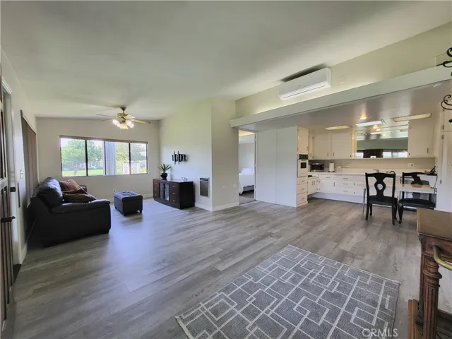 Open Floorplan overlooking Greenbelt ~ Living, Dining and Kitchen looking towards bedroom #1
