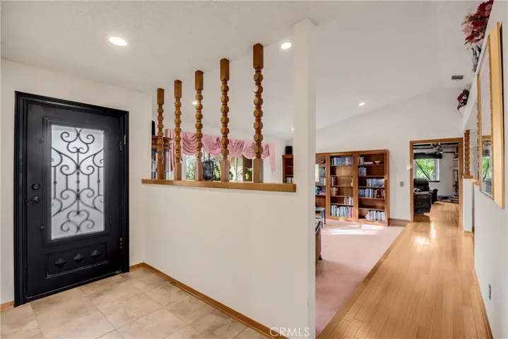 Front entry wrought iron security door with view into Living Room