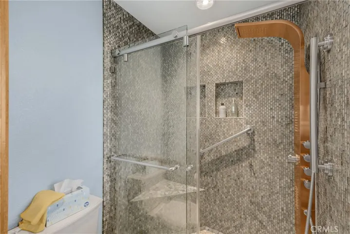 Primary Shower with Built in Seat & Full Body Shower tower