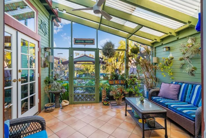 You can enter from the kitchen or the primary bedroom & enjoy an outdoor feel while still inside.
