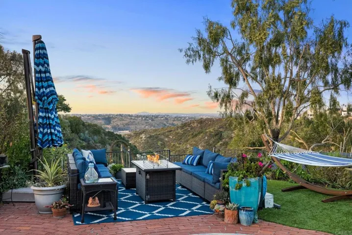 This great space space sits at the very back of the yard and is very open to that fabulous canyon.