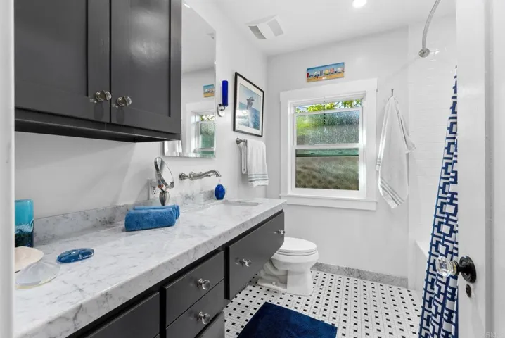Nicely upgraded and easily accessible from bedrooms 2 and 3.