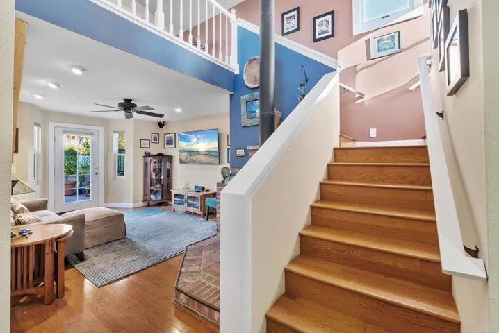 Just off the kitchen, this 2 story space could be used as a family rm with 2 bedrooms up the stairs