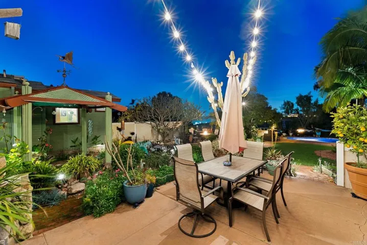 The next 12 pictures will show the incredibly landscaped backyard of this home.