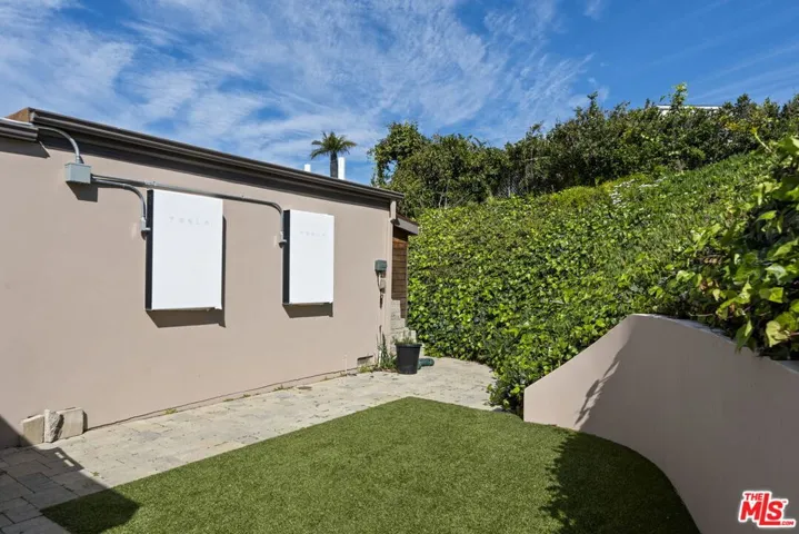 Two Tesla Charging Backup Batteries To Power Home
