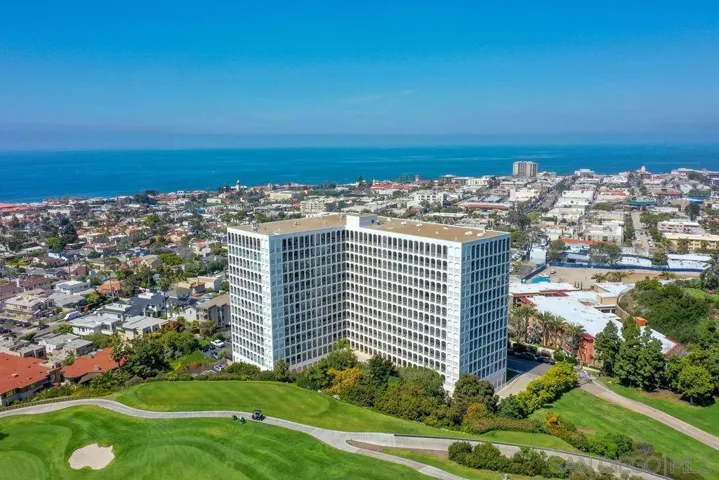 The Seville with South facing views to the LA Jolla Country Club Golf Course and ocean and North facing views to ocean - and La Jolla Shores