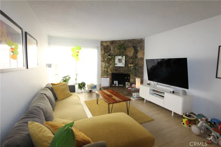 Unit A - Family room w/ fireplace