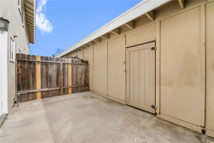 Off the kitchen is a door to a spacious private patio, perfect for enjoying family/friends