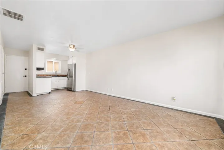 The dining area off the kitchen, with a door to the private patio
