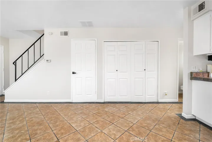 Stay organized with 2 convenient storage closets, providing space for household essentials